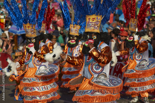 Morenada dancers in traditional Andean costume performing at the annual Carnaval Andino con la Fuerza del Sol in Arica, Chile. photo