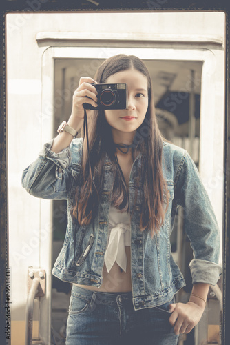Beautiful girl photography concept on train vintage style,lifestyle,hipster