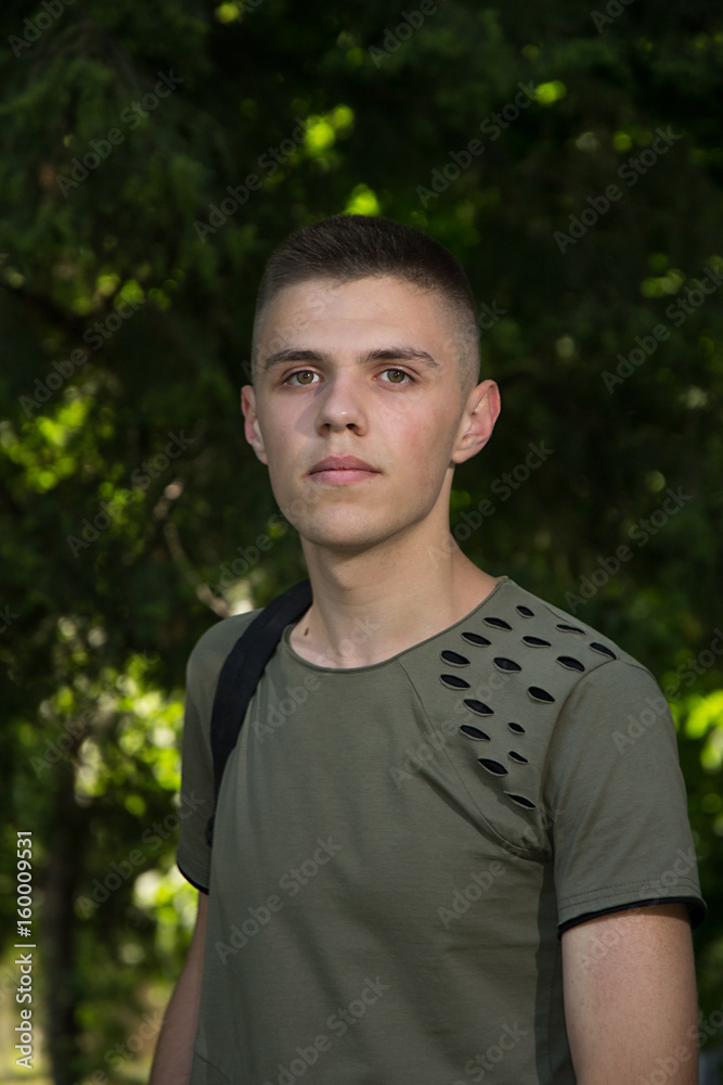 Portrait Of A Man looking At The Camera, teenager Portrait Of A Man looking At The Camera, teenager