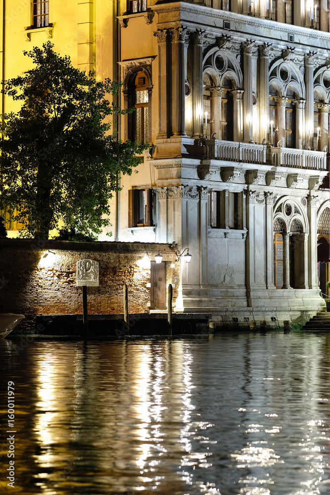 Venice, Italy, May, 31, 2017: night landscape with the image of building on a channel embankment in Venice, Italy