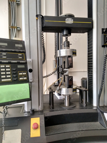 tensile strength testing machine on laboratory photo