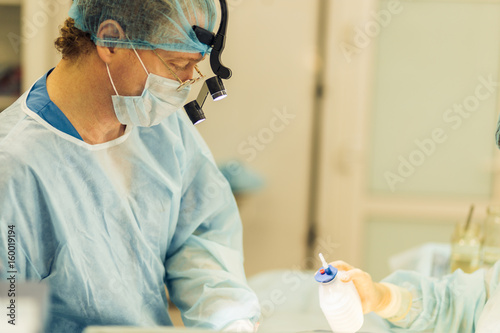 portrait of Surgeon operating live shot photo
