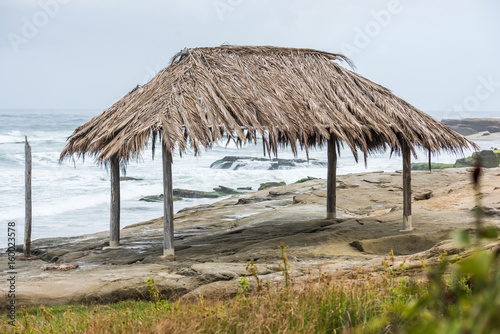 Old cabana on the coast © miralphs