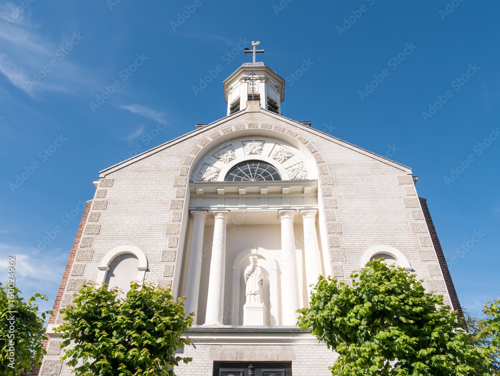 Facade of Parish Church with statue of Saint John of Nepomuk, Woudrichem, Netherlands