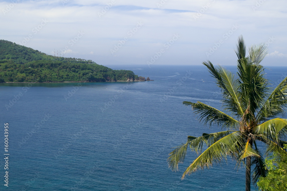 Sea view with coconut tree of Lombok indonesia. 