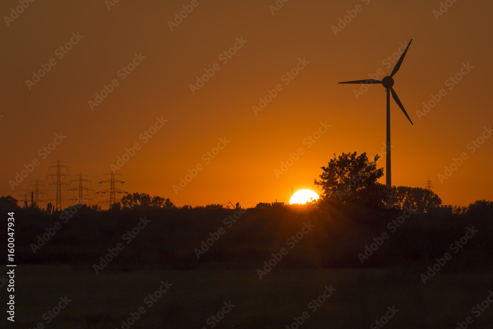 Obraz premium Windrad im Sonnenuntergang
