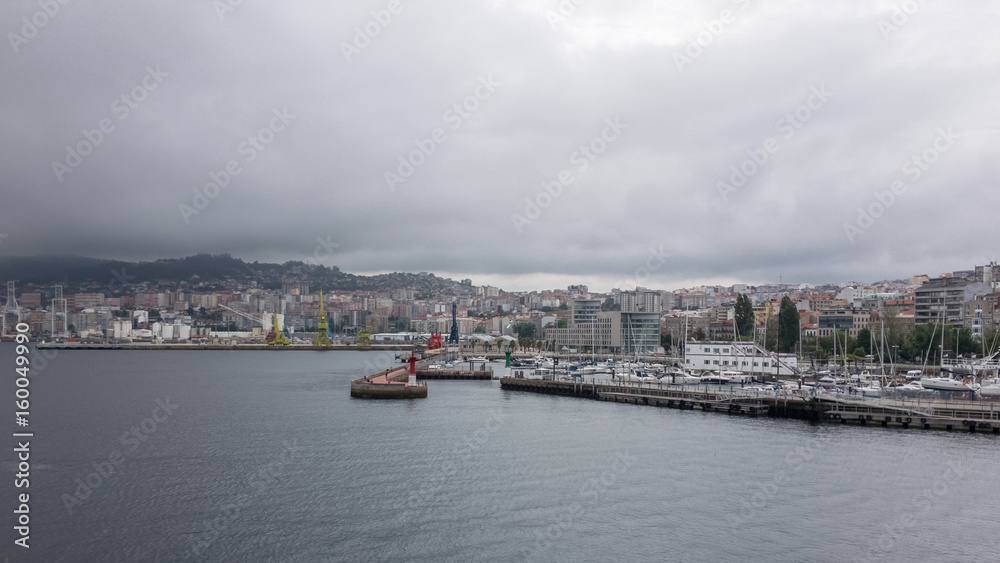 Panoramic view of Vigo, Spain on an overcast day as seen from the water
