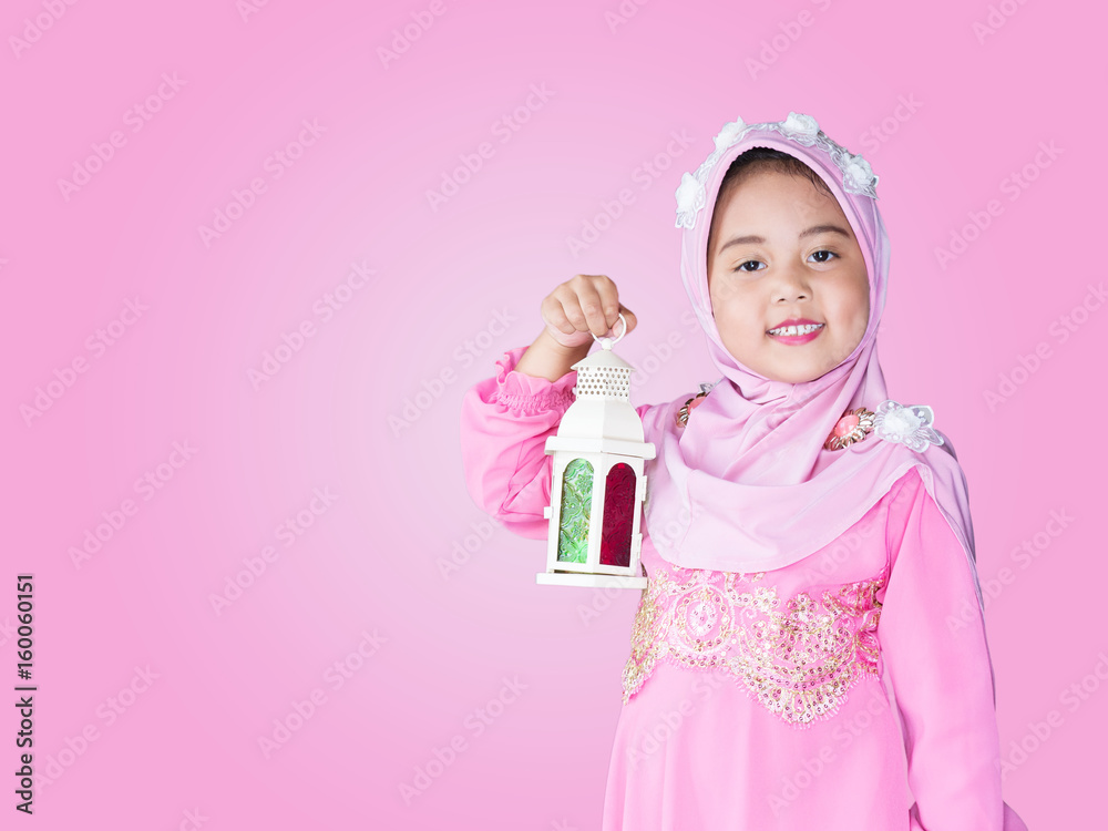 happy muslim girl with full hijab in pink dress happy muslim girl with full hijab in pink dress