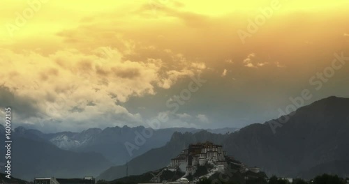 4k Potala Palace in the morning,Lhasa,Tibet.time lapse clouds flying over mountains. photo