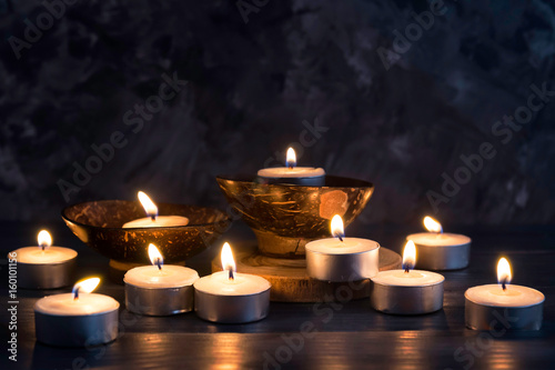 Many burning candles in dark background   in concept spa relaxing   holiday  merry christmas  REST IN PEACE