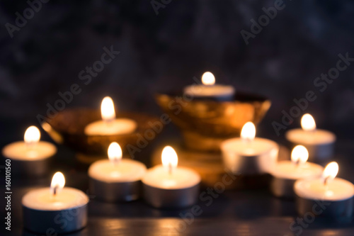 blurred Many burning candles    in concept spa relaxing , holiday ,merry christmas, REST IN PEACE
