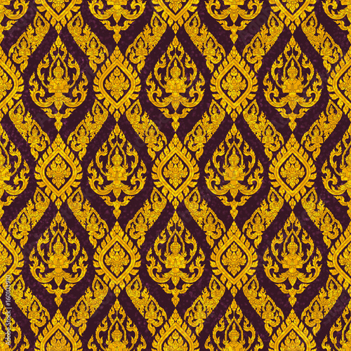 Thai floral motif of the figure of deva, seamless background.