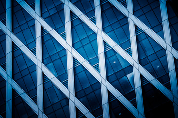 detail shot of modern architecture facade,business concepts in blue tone,shot in city of China.
