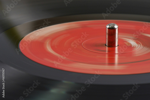 close up playing turntable