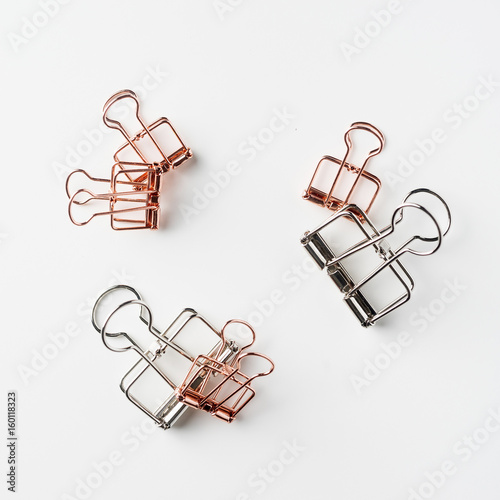 Top view of empty copper and silver clip on white background desk for mockup  collection of diverse angle..
