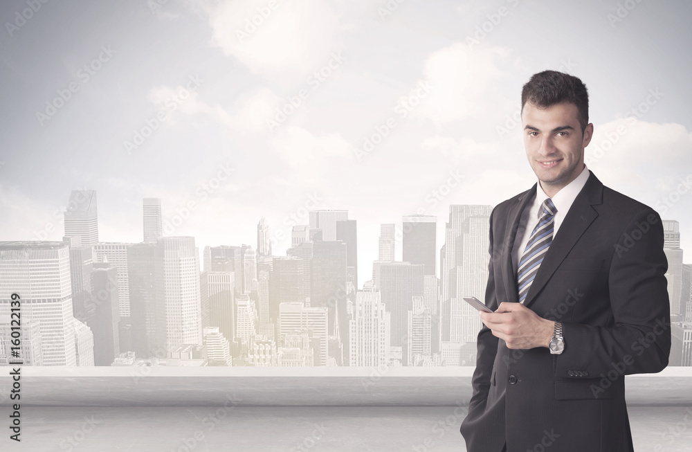 Sales person talking in front of city scape Sales person talking in front of city scape