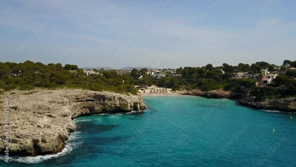 Aerial landscape of the beautiful bay of Cala Mandia with a wonderful turquoise sea, Porto Cristo, Majorca, Spain Aerial landscape of the beautiful bay of Cala Mandia with a wonderful turquoise sea, Porto Cristo, Majorca, Spain