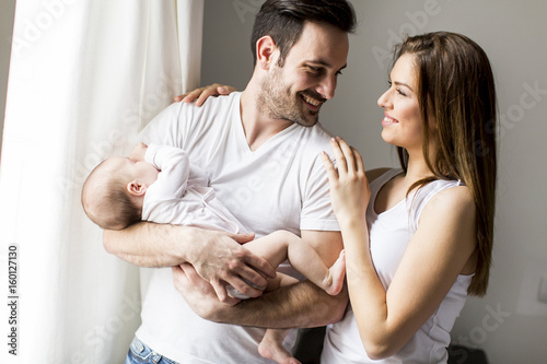 Happy family with newborn b...