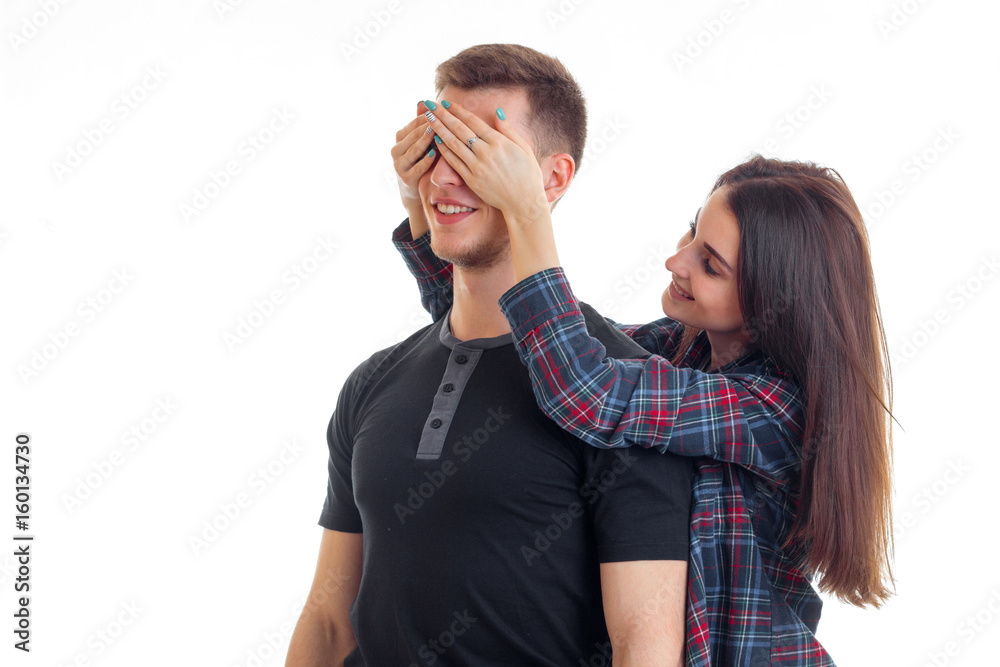 young love smiling girl closed eyes hands her boyfriend young love smiling girl closed eyes hands her boyfriend