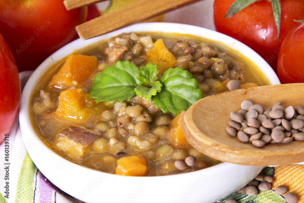 Lentil stew with wooden spoon Lentil stew with wooden spoon
