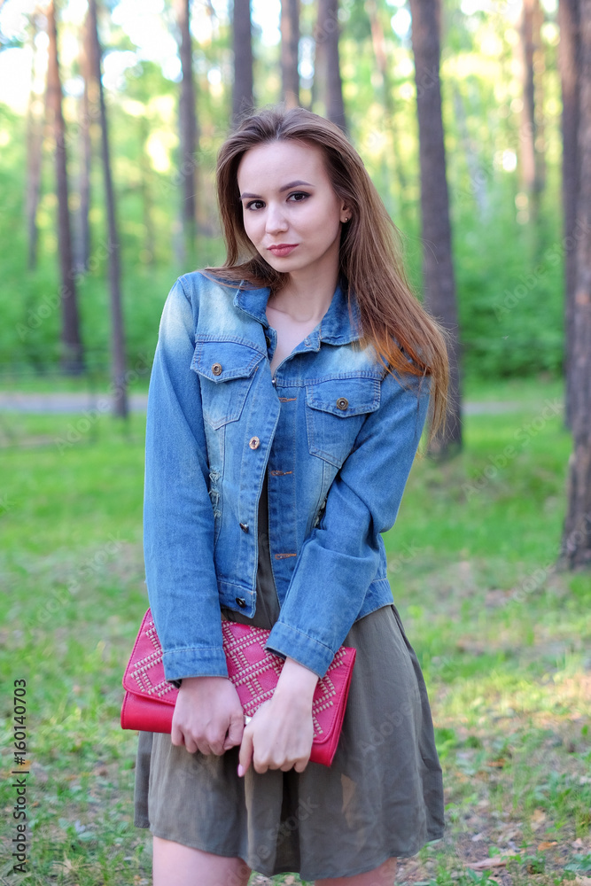 Beautiful sexy woman glamor fashion model female perfect beauty pose wear in park romantic date. Beautiful sexy woman glamor fashion model female perfect beauty pose wear in park romantic date.