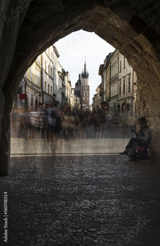 View on Florianska street in Krakow through old city gate photo