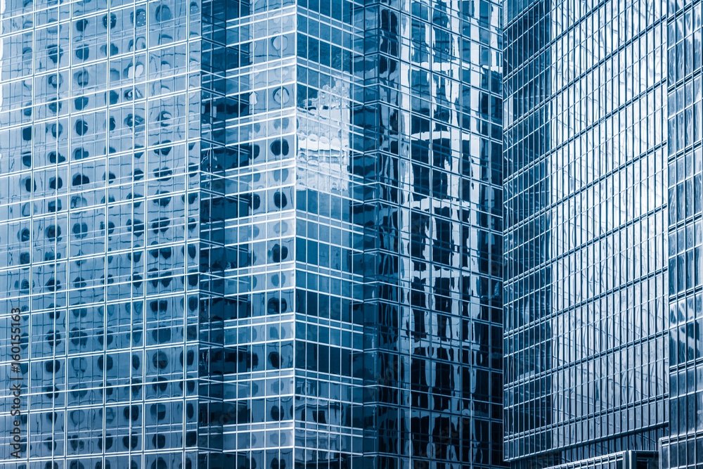 detail shot of modern architecture facade,business concepts in blue tone,shot in city of China.