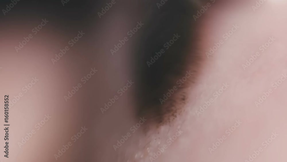Master in gloves does tattoo of eyebrows close-up Master in gloves does tattoo of eyebrows close-up