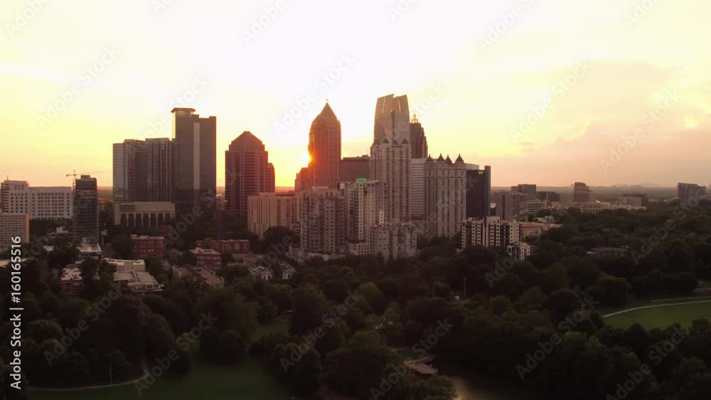 Atlanta Aerial v243 Flying low over Piedmont park with midtown cityscape views at sunset Atlanta Aerial v243 Flying low over Piedmont park with midtown cityscape views at sunset