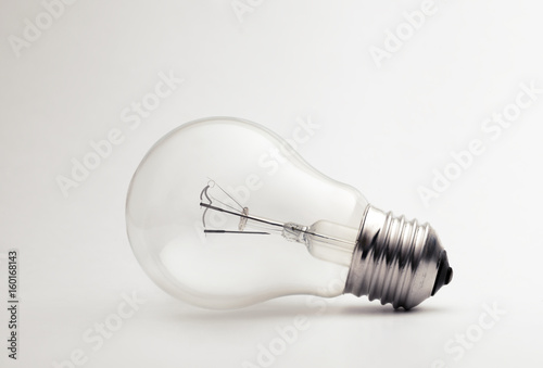 Transparent light bulb on a white background.