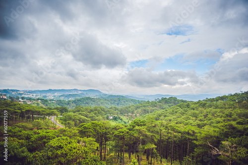 Fantastic landscape of Dalat Mountains, Viet Nam, fresh atmosphere, villa among forest, impression shape of hill and mountain from high view, wonderful vacation for ecotourism in spring photo