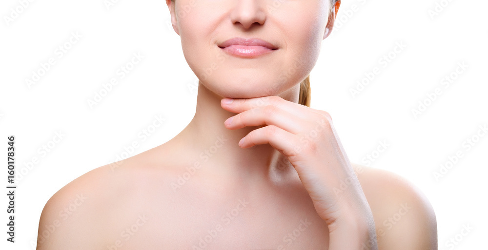 Portrait of girl with nude make-up with hands on chin isolated on white background. Girl with clean healthy skin on white. Cosmetology, medicine, beauty care. Nude makeup