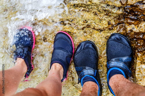 Young couple in water shoe