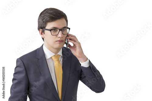 Isolated portrait of a businessman on phone