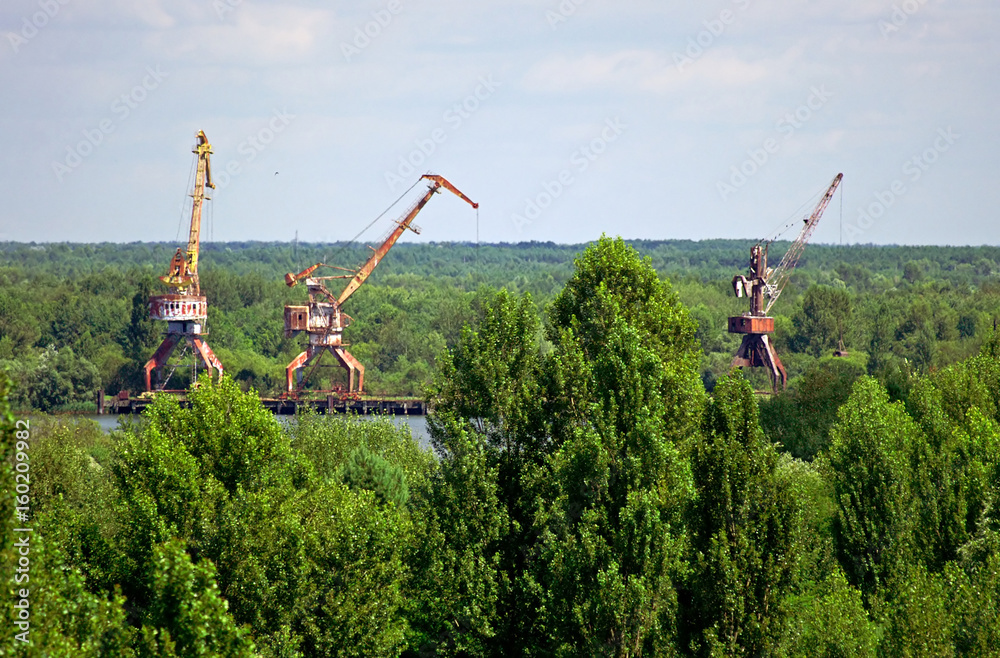 Abandoned industrial cranes in Chernobyl Zone. Chornobyl Disaster Abandoned industrial cranes in Chernobyl Zone. Chornobyl Disaster