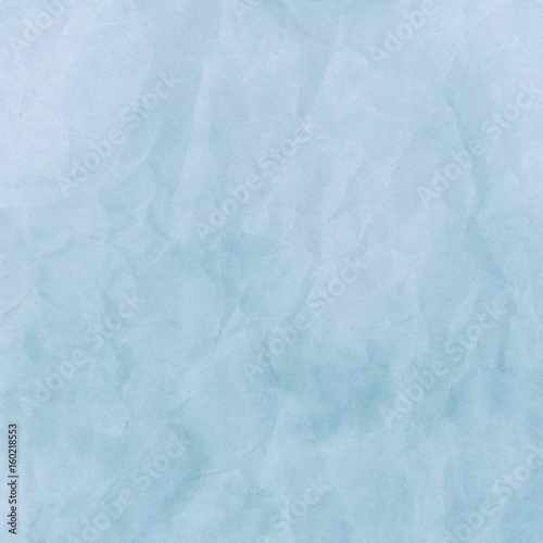 Blue crumpled paper for background