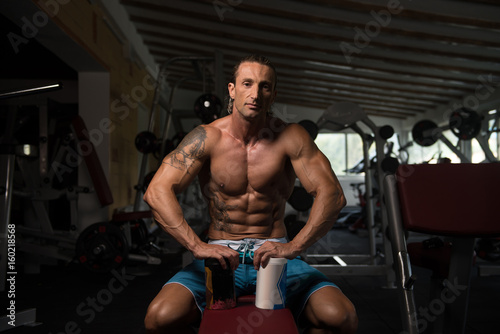 Man Posing With Supplements For Copy Space