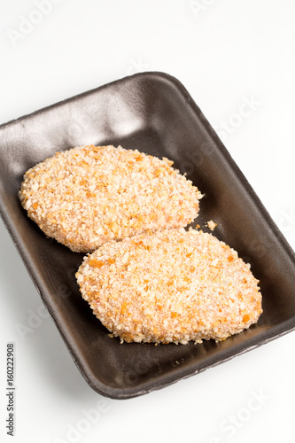 Obraz na płótnie Raw food, chicken cutlet ready for prepare w salonie