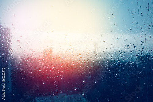 Raindrops on window glass surface