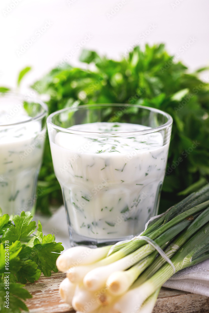 Ayran with fresh herbs. Traditional Turkish yoghurt drink. Ayran with fresh herbs. Traditional Turkish yoghurt drink.