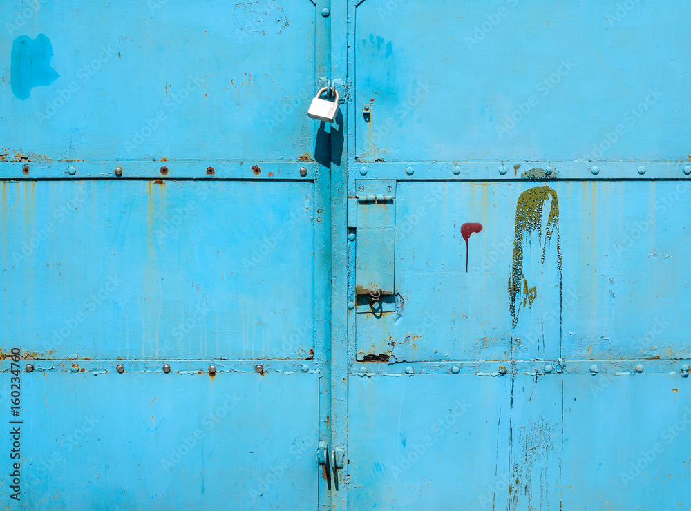 Old blue metal door texture for background Old blue metal door texture for background