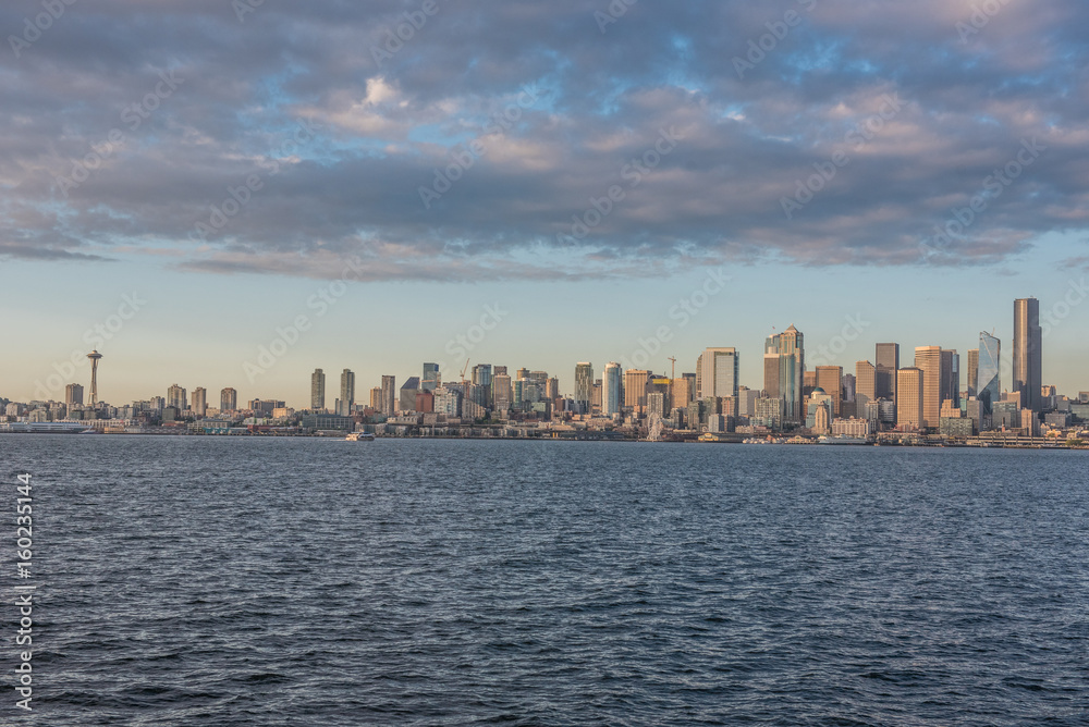 downtown seattle skyline, viewed from alki beach park at sunset. Stock  Photo | Adobe Stock