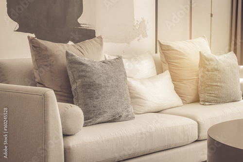 modern living room with set of pillows on sofa