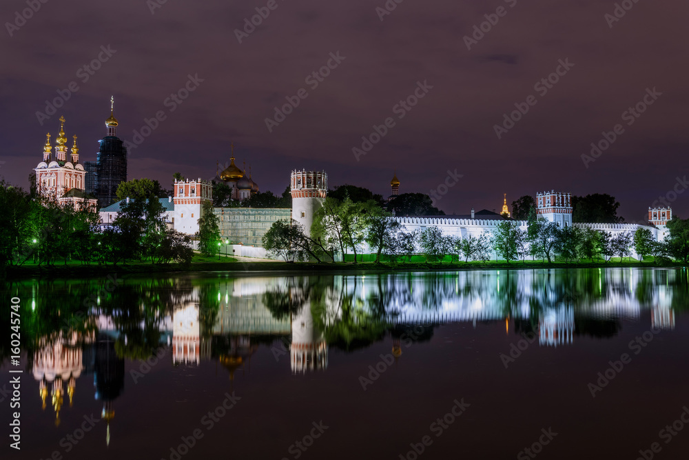 Fototapeta premium night Moscow Novodevichy monastery river reflection