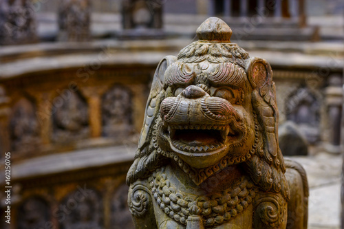 The ancient beast gurading the sacred temple, Lalitpur Nepal photo