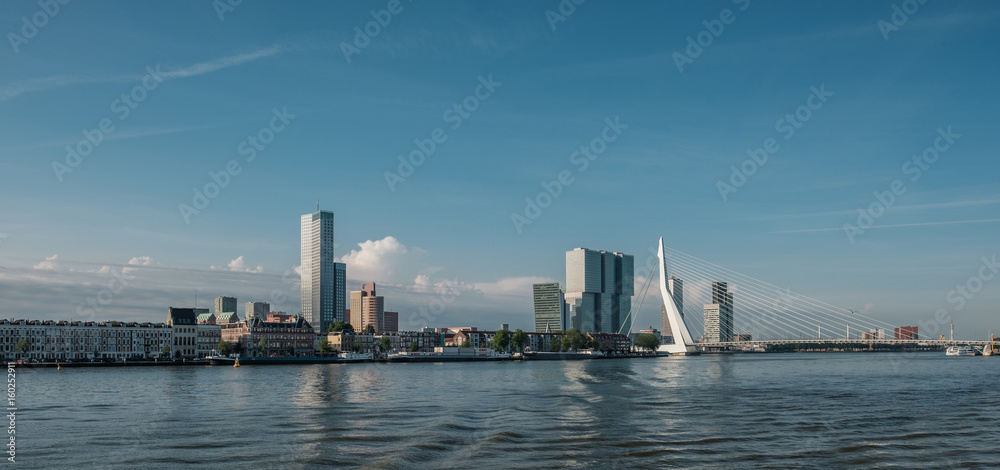 Rotterdam city cityscape skyline with Erasmus bridge and river. South Holland, Netherlands.