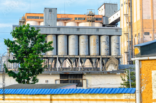 Plant for the production of baked goods. Elements of the facade of the production building. Factory background photo