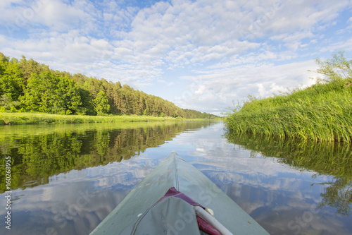 Canoeing on the river Ugra in national resort in the Russian Kaluga Region in June © grigorylugovoy