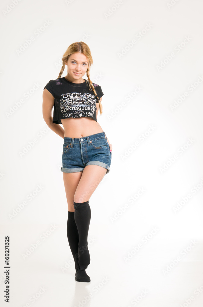 Fototapeta premium Girl with pigtails isolated on white background