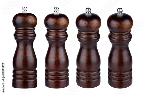 Pepper mill isolated. Dark wooden pepper mill isolated on white background, collection of different angles